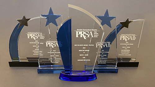 a group photo of five prsa awards