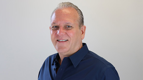 headshot of ron perine